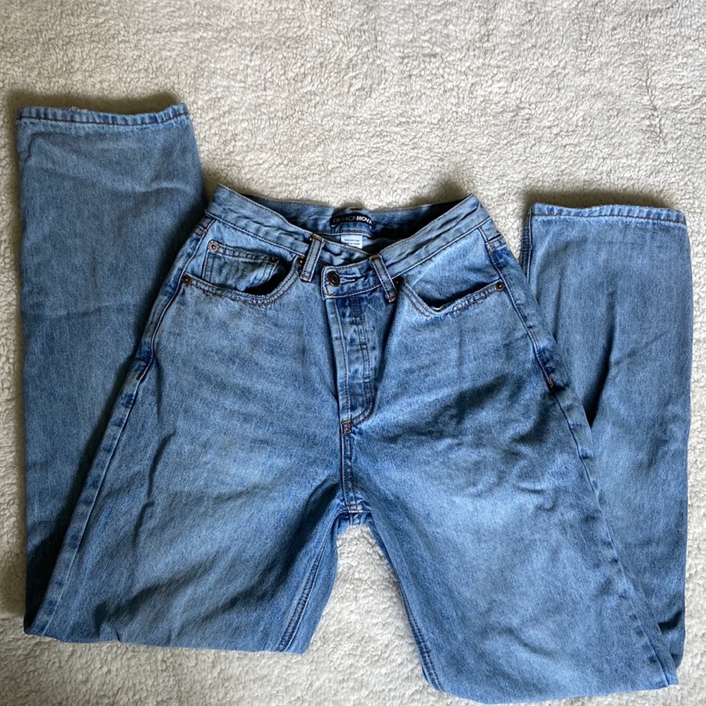 Asymmetrical waist straight leg jeans
